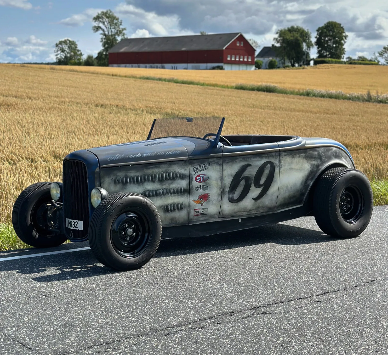 1932 Ford Roadster hot rod with weathered race paint and hand-painted number 69