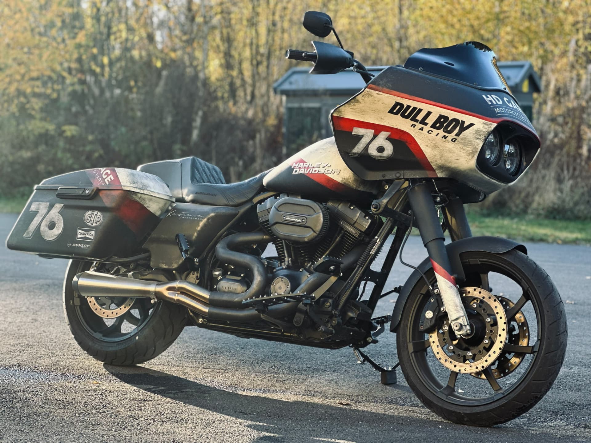 Front three-quarter view of the Dull Boy Racing 76 bagger in autumn light