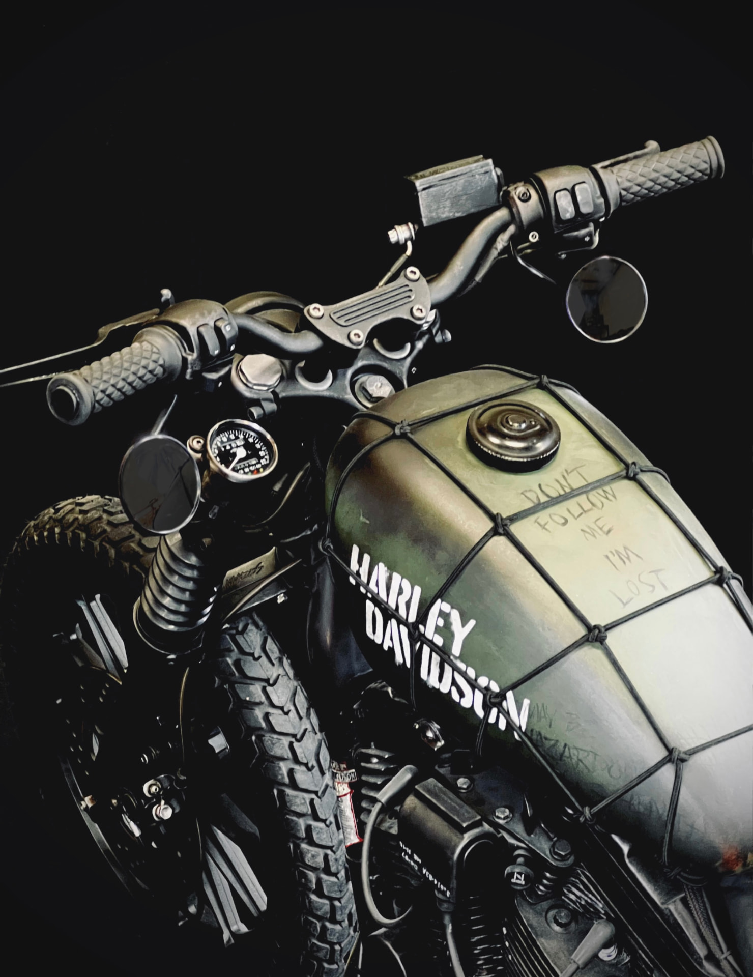 Army green Harley-Davidson tank with hand-lettered text