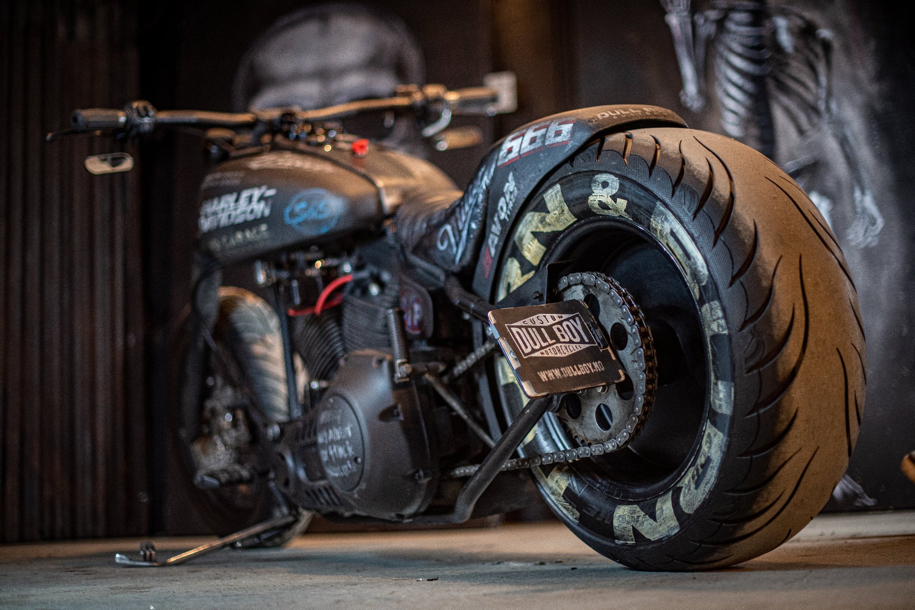 Custom Harley-Davidson bobber rear wheel and engine detail