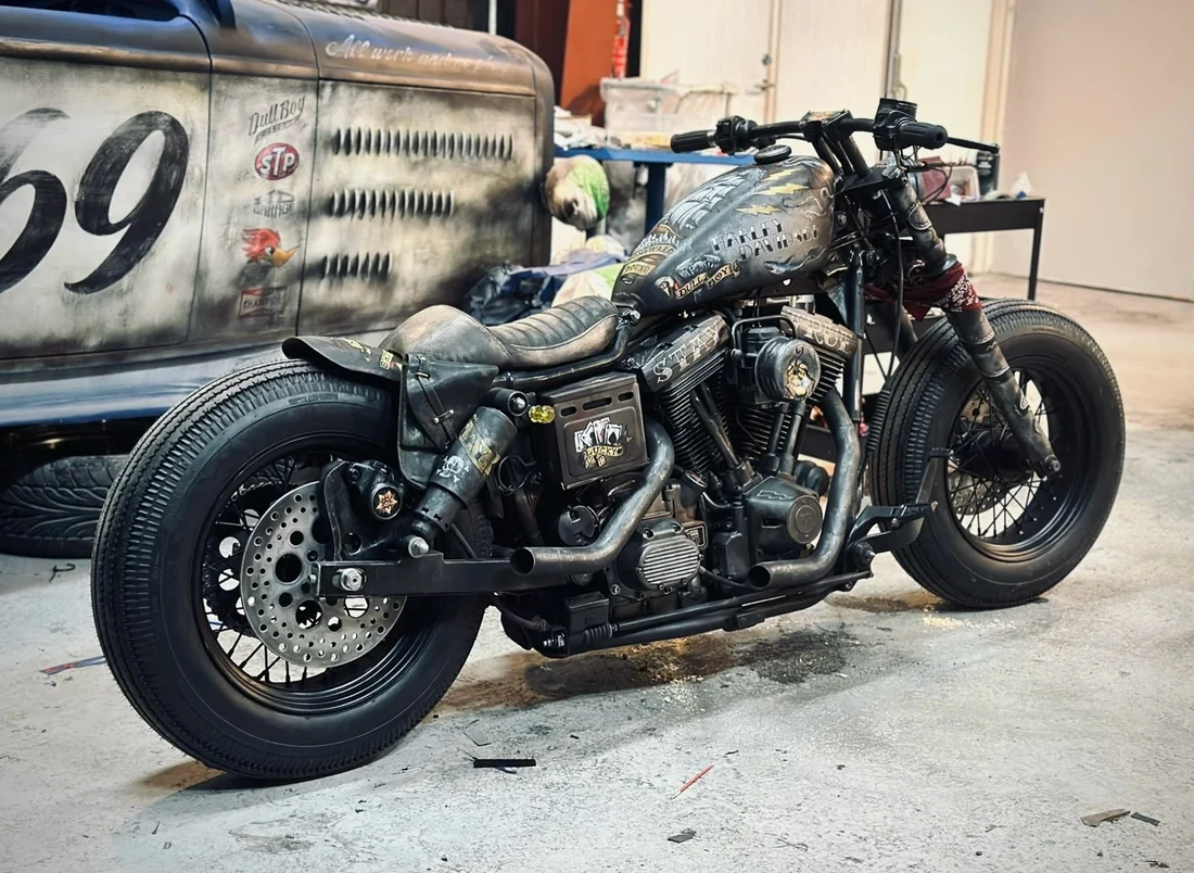 Custom Harley-Davidson bobber with hand-painted tank