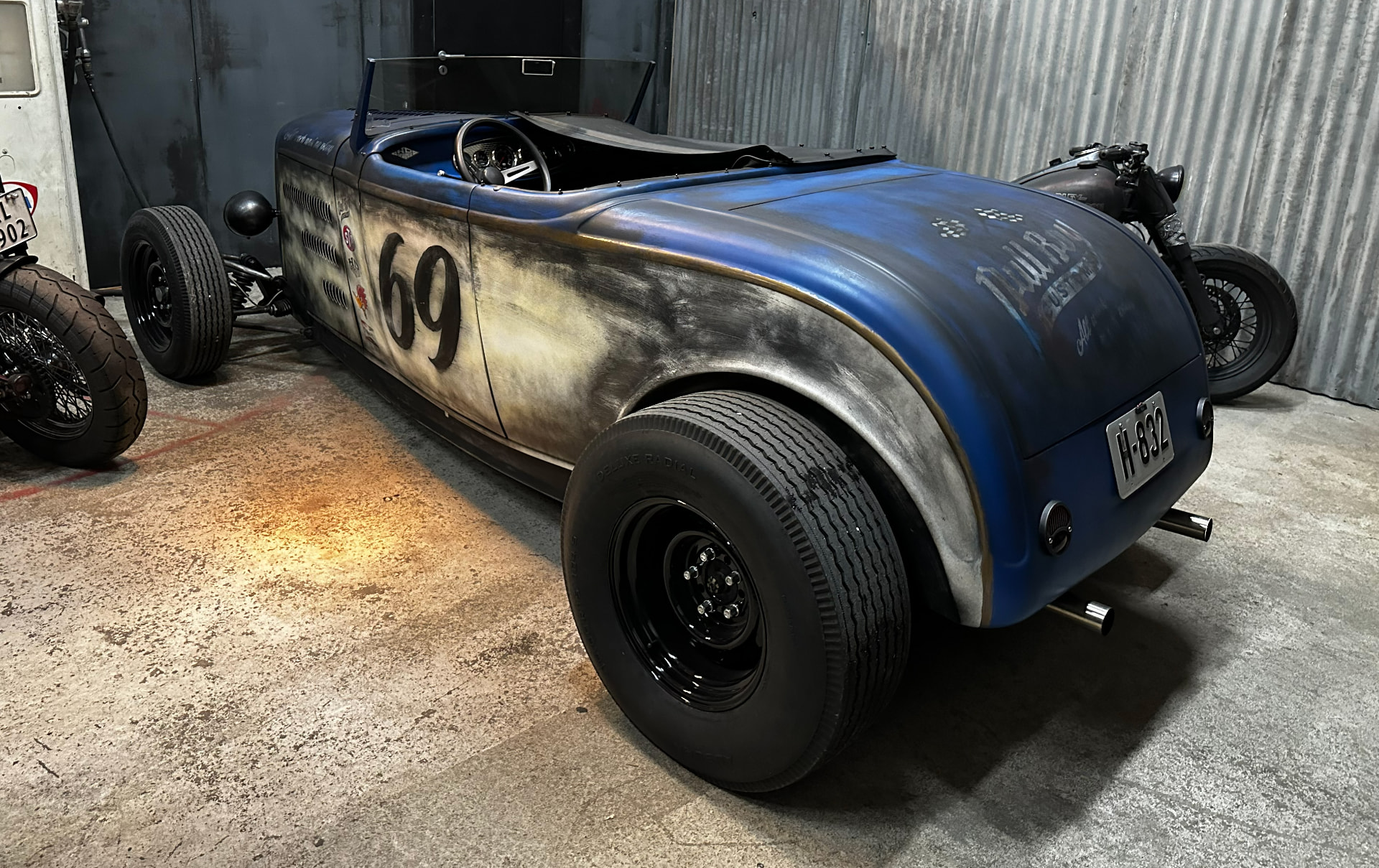 Rear three-quarter view of the '32 Ford Roadster in the workshop