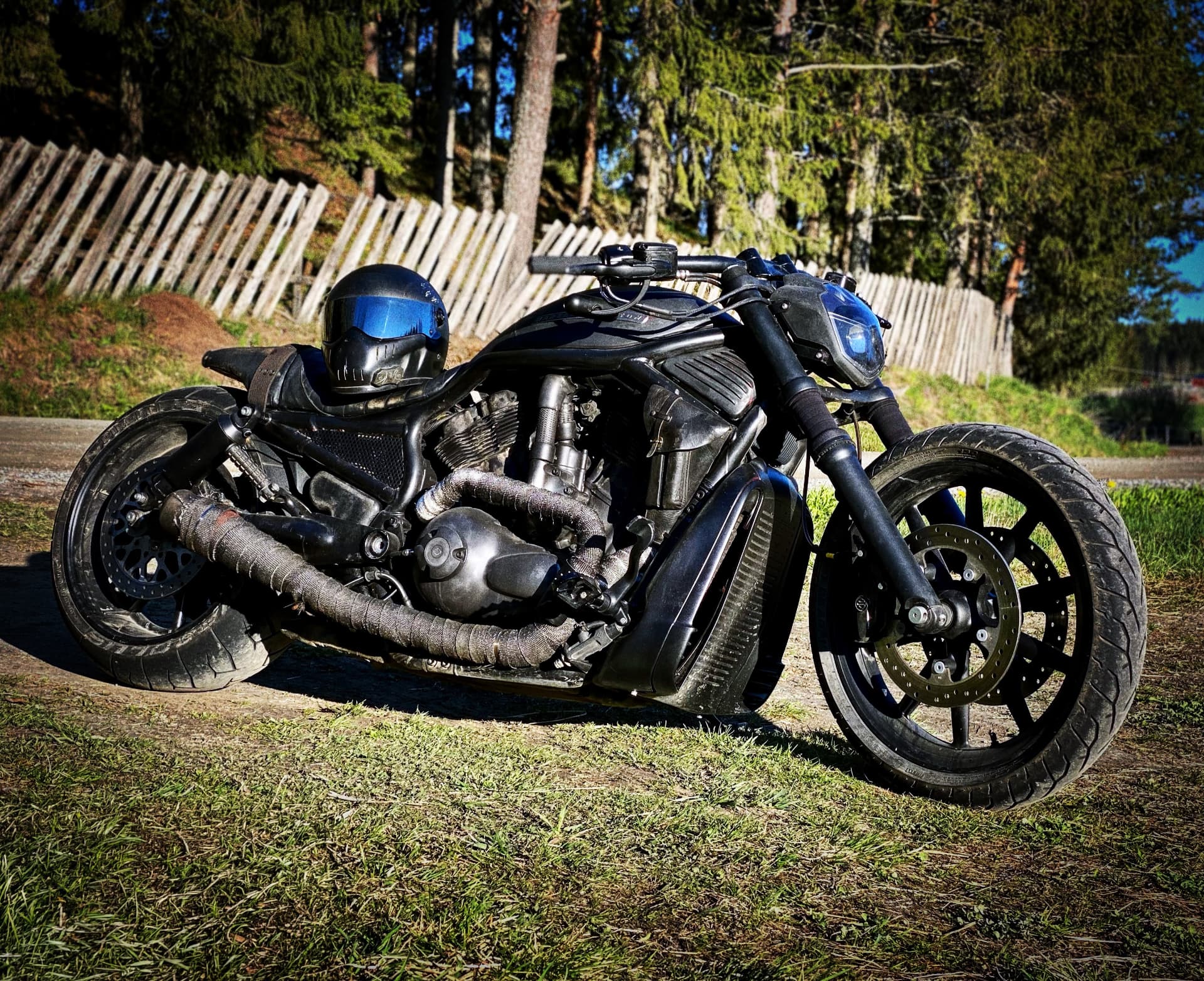 Custom Harley-Davidson V-Rod muscle bike with wrapped exhaust